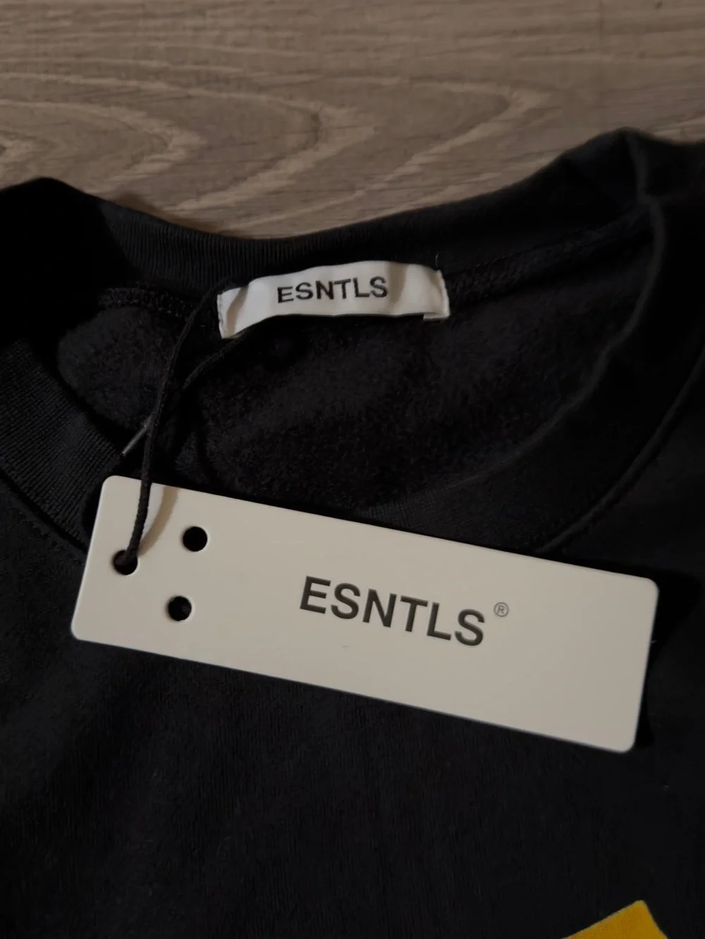 ESNTLS Black Sweatshirt with Yellow Cat Bag Graphic